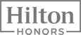 The image features the Hilton Honors logo, with the words “Hilton Honors” in a grey, bold font within a rectangular border.